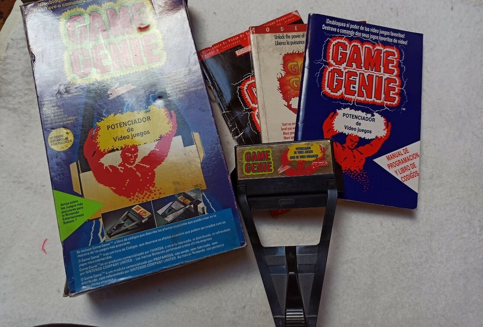 GAME GENIE POTENCIADOR DE VIDEOJUEGOS USADO .(150)