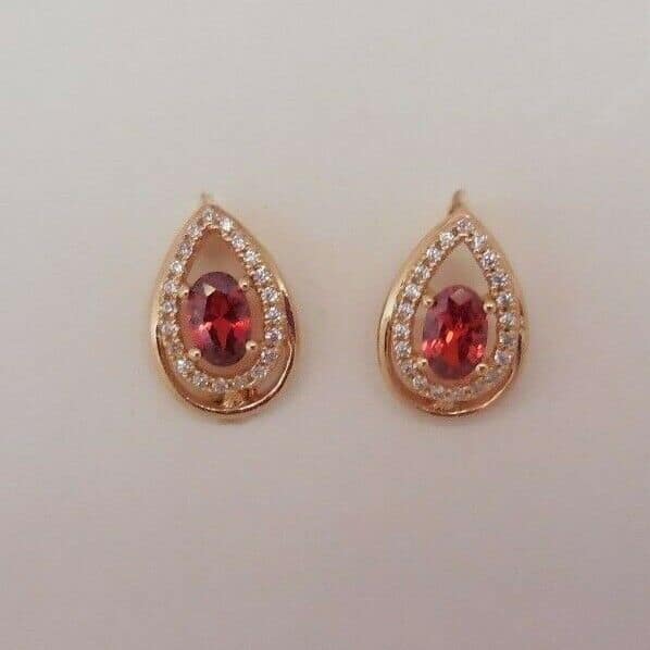 Pendientes de bisuteria con piedra color rojo