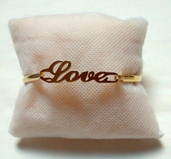 Pulsera acero mujer dorada rígida con love y cierre nueva