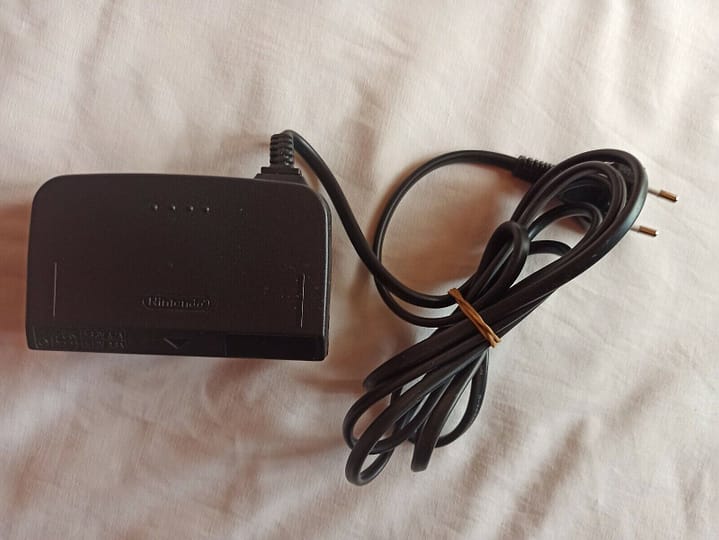 ADAPTADOR CORRIENTE NINTENDO 64 ORIGINAL NINTENDO  NUEVO SIN PRECINTO (154)