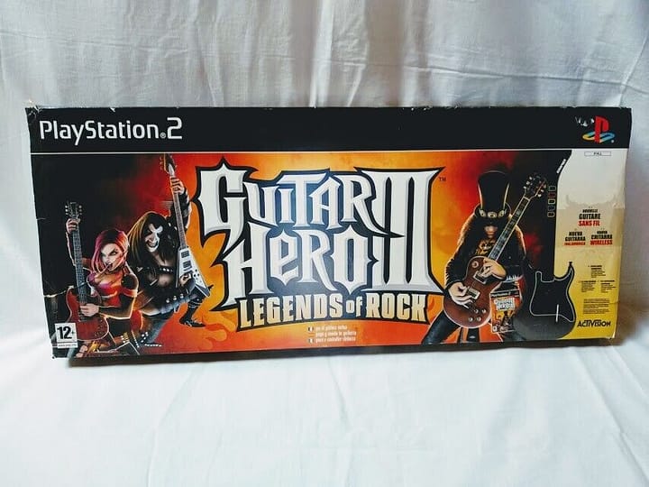 Guitar Hero III Legends of the rock juego y mando guitarra play2 Nuevo PAL