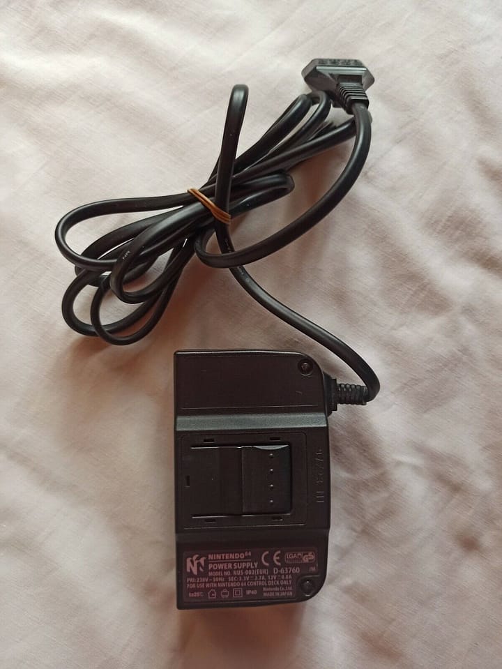 ADAPTADOR CORRIENTE NINTENDO 64 ORIGINAL NINTENDO  NUEVO SIN PRECINTO (154) - Imagen 3
