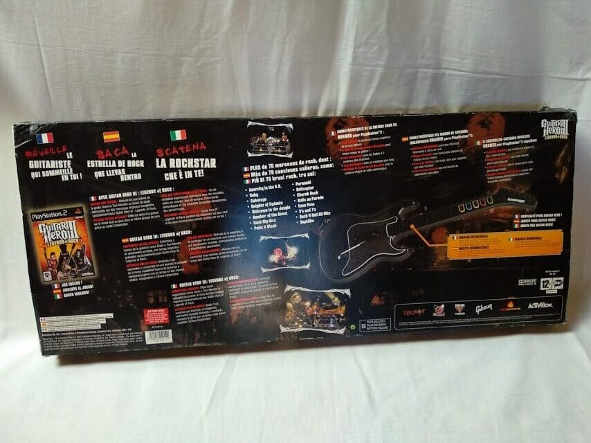 Guitar Hero III Legends of the rock juego y mando guitarra play2 Nuevo PAL - Imagen 3