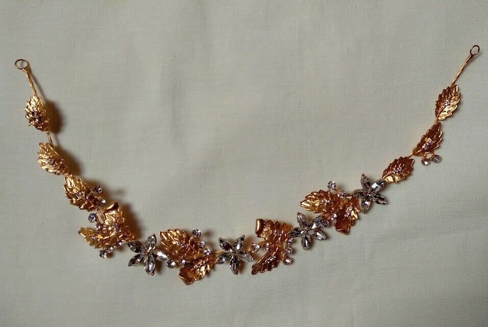 Tocado aderezo tiara dorada con cristales en forma de flor Nuevo